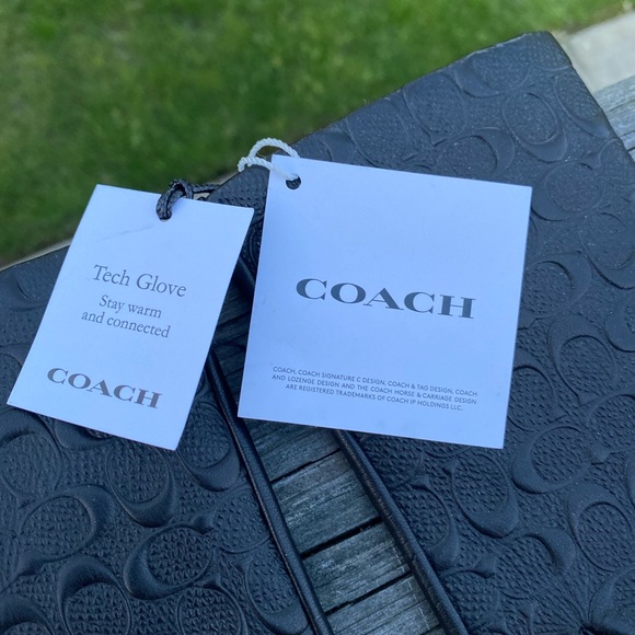 Black leather coach gloves